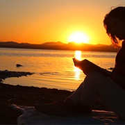 Read a Book While Watching the Sunset.