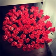 Receive a Dozen Red Roses