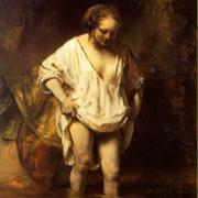 A Woman Bathing in a Stream