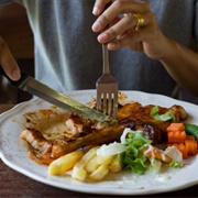 Eating Giant Portions.