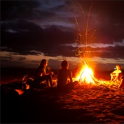 Cooked Christmas Dinner on a Bonfire on the Beach