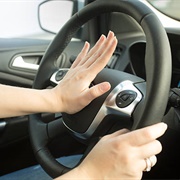 Hold a Sign With Your Loved One That Says Honk If You Love Someone- Try to Get 100 Honks!