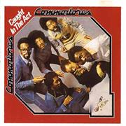 Commodores : Caught in the Act.