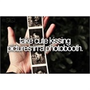 Take Cute Kissing Pictures in a Photobooth