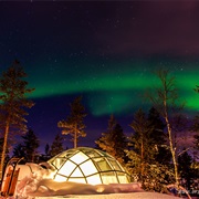 Stay in an Glass Igloo at the Kakslauttanen Arctic Resort in Finland