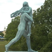 Girl Carrying Child in Oslo