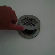 Checked the Drain of a Dishwasher for Bits of Broken Glass or Crockery