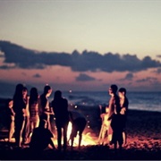 Camp on the Beach With Friends
