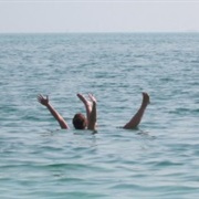Floating on the Dead Sea, Israel