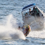 Driving the Boat While Someone Else Goes Tubing