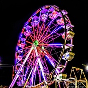 Go on a Ferris Wheel Alone at Night
