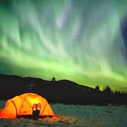 Go Camping Under the Northern Lights