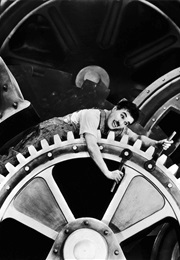 The Tramp Rolling Around the Machine in Modern Times (1936)