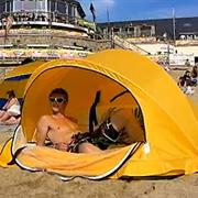 Struggling to Put Up Beach Tent
