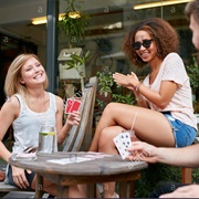 Play Cards at a Cafe