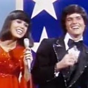 "A Little Bit Country...A Little Bit Rock and Roll"-Donny and Marie