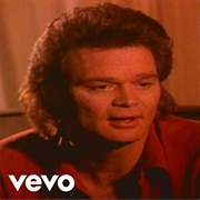 Too Busy Being in Love- Doug Stone