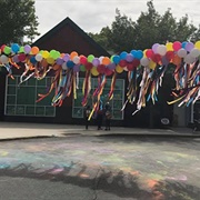 Take Pictures Under a Balloon Arch