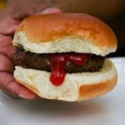 Beef Burger With Ketchup Cooked at British Race Track