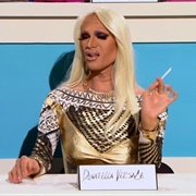 Miss Fame as Donatella Versace