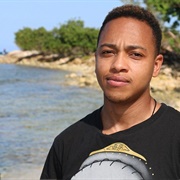 Romario Wanliss (Straight, Trans Man, He/Him)