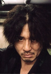 Choi Min-Sik as Dae-Su Oh (Oldboy) (2003)