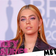 L Devine (Lesbian, She/Her)