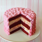 Red Velvet Raspberry Swirl Cheesecake Cake