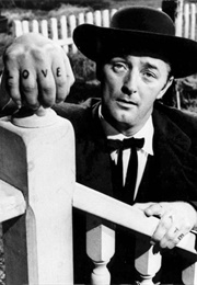 Robert Mitchum as Harry Powell (The Night of the Hunter) (1955)