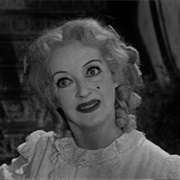 Bette Davis as "Baby" Jane Hudson (What Ever Happened to Baby Jane?, 1962)