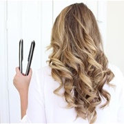 Learn to Make Curls With a Flat Iron