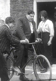 Fat Man on a Bicycle (1914)