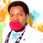 Travis Coles (Queer, Genderqueer, He/Him)