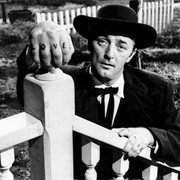 Robert Mitchum as Rev. Harry Powell (The Night of the Hunter, 1955)