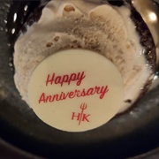 Sticky Toffee Pudding With Anniversary Decoration