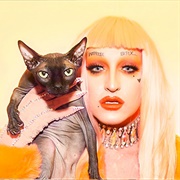 Ilona Verley (Two-Spirit, Trans Woman, Gender-Fluid/Flux, She/They)