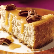 Hot Buttered Rum Cheesecake With Brown Sugar-Rum Sauce