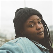 Joy Oladokun (Queer, She/Her)