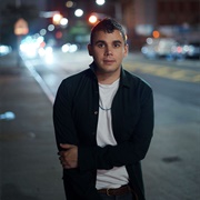 ROSTAM BATMANGLIJ (Gay, He/Him)