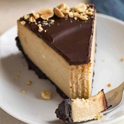 Peanut Butter Cheesecake With Chocolate Sauce