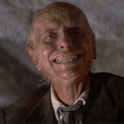 Julian Beck as Rev. Henry Kane (Poltergeist II: The Other Side, 1986)