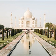Stand in Front of the Taj Mahal in India