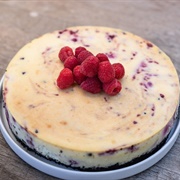 Reuschelle's Cheesecakes White Raspberry Chocolate Chip Cheesecake