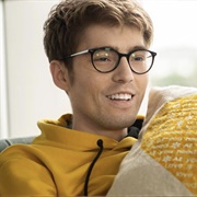 Travis Flores (Gay, He/Him)