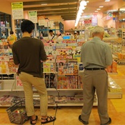 Pretending to Look at Other Thing in the Store Until the Person Moves Out of the Way