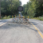 The Grave in the Middle of the Road