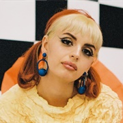 Rebecca Black (Queer, She/Her)