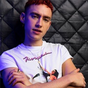 Olly Alexander (Gay, Genderqueer, He/Him)