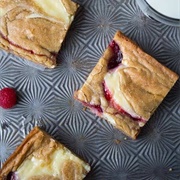 Brown Butter Raspberry Swirled Cheesecake Blondies