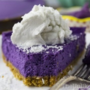 Ube Cheesecake With Coconut Cookie Crust and Coconut Whipped Cream